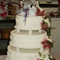 My First Wedding Cake This is my first stacked cake. I had not taken any classes when I made this one. A friend asked me to make it for her sister.