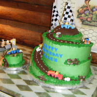 Car Cake buttercream w/ fondant accents and fondarific chocolate. I'm sure the idea for this cake came from someone here but I couldn't...