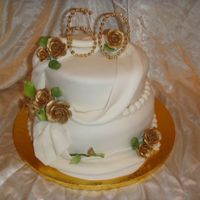 60Th Wedding Anniversary Fondant covered cakes with beaded 60 and GP roses painted with gold luster dust.