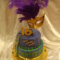 Mardi Gras Wanted to do the mask out of gumpaste but she didn't have the budget. I'm still pretty happy with it. TFL!!