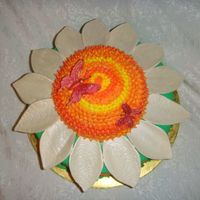 Dsc00705.jpg Flower Cake with gumpaste petals and butterflies.