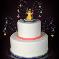 Princess Dora For my niece's birthday. Figure and stars are made from gumpaste and cake is covered in fondant.
