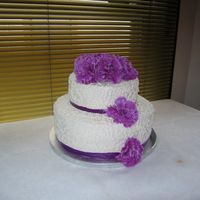 Img_0970.jpg wedding cake, 8, 12 in. carrot cake, corneli lace with purplesilk flowers