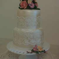 Lace Wedding Cake My first wedding cake - the bride wanted a cake that wasn't the standard size or design. I got my inspiration from a cake by Mich...