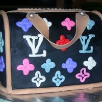 Louie Purse 6 in choc. cake with fondant accents