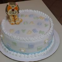 Copy_Of_Finished_Cake.jpg This was a yellow cake with no filling. I used Michelle Foster's fondant recipe. The cake covered in white fondant, with pale blue,...