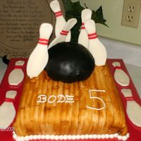 Bowling Cake Here is a cake I did that was inspired by another cake on the board, I'm sorry I do not know the bakers name to give proper credit but...