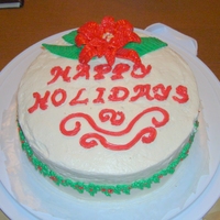 1St Christmas Cake Short notice and no money got me this design. 1st attempt at making a fondant poinsettia. I hate the squigly things I did to fill space &...