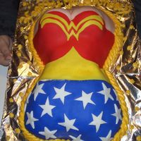 Diane's 40Th B-Day Wonder Woman Cake 1st attempt at sculpting a cake and 1st attempt at covering with fondant. Buttercream border. Lemon cake with raspberry filling. Actually a...