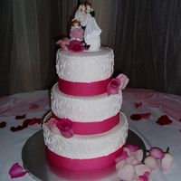 P1010010.jpg Bride wanted the "old fashioned" bride and groom topper to include their daughter. I had to get a communion cake topper little...