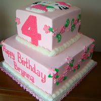 Hello Kitty This is a 10" & 6" Chocolate cake covered in b/c with fondant flowers. thanks to Marilyn for such a beautiful cake.