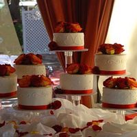 Crystal Splendor Stand This bride and groom had a fixation with the number 7. So we did 7 7" cakes with 7 roses on top of each one. More work than I expected...