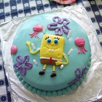 Spongebob Spongebob and Jellyfish...MMF over buttercream. All decorations aside from flowers are MMF. :)