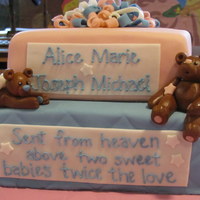 Sent From Heaven Above... Made for twins baptism. One chocolate, one white, covered in buttercream and MMF. All MMF decorations.
