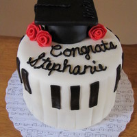 For The Love Of Music For a band teacher that loves playing the piano and graduated with her second masters degree. Iced in buttercream, covered in fondant with...