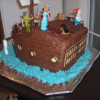 Peter Pan Cake I made this cake for a girl's 2nd birthday. It was all we could do to keep her from stealing Tinkerbell. The cake was 4 9x13 layers,...