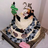 25Th Anniversary I made this cake for some special friends,but I forgot my camera. These pics were e-mailed to me.All edible. Buttercream with fondant...