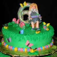 Julia's Cake Closer view. The fairy looks like she had a few drinks before she put on her lipstick. My painting skills are a work in progress.