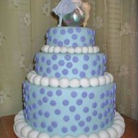 Tiered Bubble Fairy Cake This is a fondant cake with an Amy Brown Bubble Fairy Topper. The picture doesn't show it very well, but the polka dots match the...
