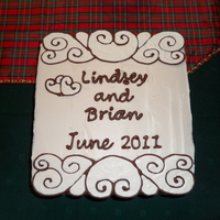 Engagement Cake Made the decorations from white and milk chocolate, 2 layer funetti cake, filled with french vanilla pudding and frosted with white...