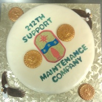 Military Family Day I made this cake for my husbands military family day. Cake is white with vanilla bean buttercream icing. The units patch and military print...