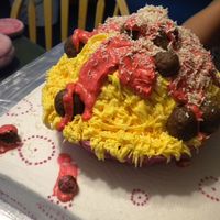 Spagetti And Meatballs For the staff day at my DD school, all buttercream, fondant for the bowl, and molding choc meatballs, shaved white choc for the cheese.