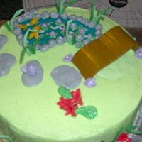 The Garden As soon as I saw Benga's cake, I was inspired, so I had to try one of my own. My son is into the coy ponds and my daughter loves to...