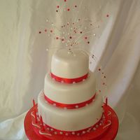 Red Crystal Cake a stacked 3 tier chococlate cake with a handmade crystal topper..all sprayed with pearl lustre and glitter