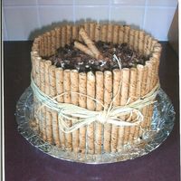 Pirouline Cookie Cake This is a cake that i did for my mother's birthday. It is a tiramisu cake with french vanilla pirouline cookies. My mom LOVED it!