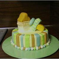 Baby.jpg the bottle and pacifer are covered in fondant the rest is buttercream