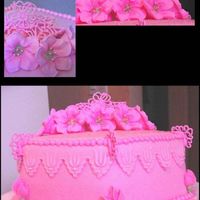 Pink Petunia Passion A tender white layer cake with Raspberry filing, covered in pink buttercream and fondant. Lace strips cut from fondant, tip 7 ball border...