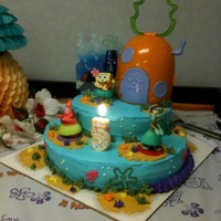 Bailey's 5Th Birthday Cake Bought house and figures. The rest is butter cream.