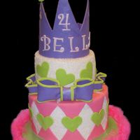 Bella's 4Th Cake covered in sugar sparkles, fondant accents, crown of gumpaste.