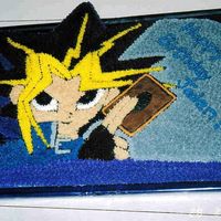 Yu-Gi-Oh I printed this picture off of the internet and traced it on the cake.