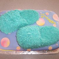 Fuzzy Slippers I used fondant and buttercream icing. This was a quick and easy cake!