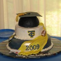 Graduation Cake I made this for my Nephew...The cap is made from rice crispie treats covered in black fondant. The mortarboard is made from gumpaste, as...