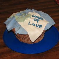 Loads Of Love Laundry basket with fondant baby "clothes". This cake turned out to be my 1st true disaster. It slid apart as I turned into the...