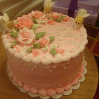 Angels Angels decorating the cake made of gumpaste, I think they are the cutest. TFL