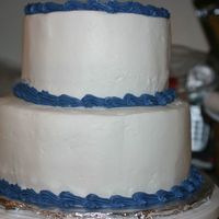 Practice Cake This is my third cake. It is the first tiered one that I have made. It is a white cake with a raspberry mousse filling. I am happy that...