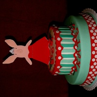 Olivia Pig Olivia is fondant on a gumpaste base for stability. The roses are on pieces of floral wire.