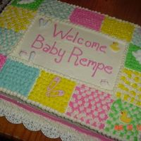 Quilt Cake This is my first baby shower cake. I started cake decorating last November. It was for a 3rd grade teacher who was given a surprise baby...