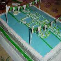 Swim Team Banquet I made the top look like a swimming pool with lane ropes and backstroke flags.