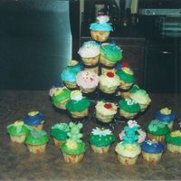 Baby Shower Cupcakes These cupcakes were for a baby shower that had a carebear theme. These cupcakes matched the color of the carebear and were decorated with...