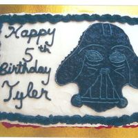 Darth Vader Birthday Cake This is chocolate fudge cake with chocolate filling and vanilla buttercream covers the outside. It was a special request from a 4 yr old...
