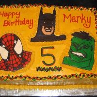 Superheros White and chocolate cake with buttercream transfers!