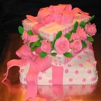 Package Full Of Roses Fondant roses, fondant bows. Buttercream accents.