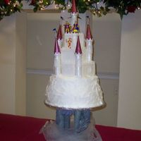 Castle Cake Hexagon cakes covered in fondant, two bottom rounds roughly covered in buttercream to emulate snow.