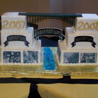 Perrine Bridge Cake This cake was for a local junior college Black Student Alliance event. Two 3 tiered cakes, iced in buttercream, stacked so that the...