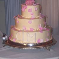 Rose Petal Cake Buttercream with gumpaste rose and rose petals. Gumpaste monogram dusted with pearl dust.
