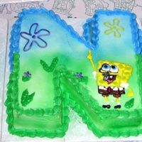 Sponge Bob First Birthday Cake Although Sponge Bon is not a favorite of mine, this cakes was so much fun! I made one round and two square ten inch cakes, then carved them...